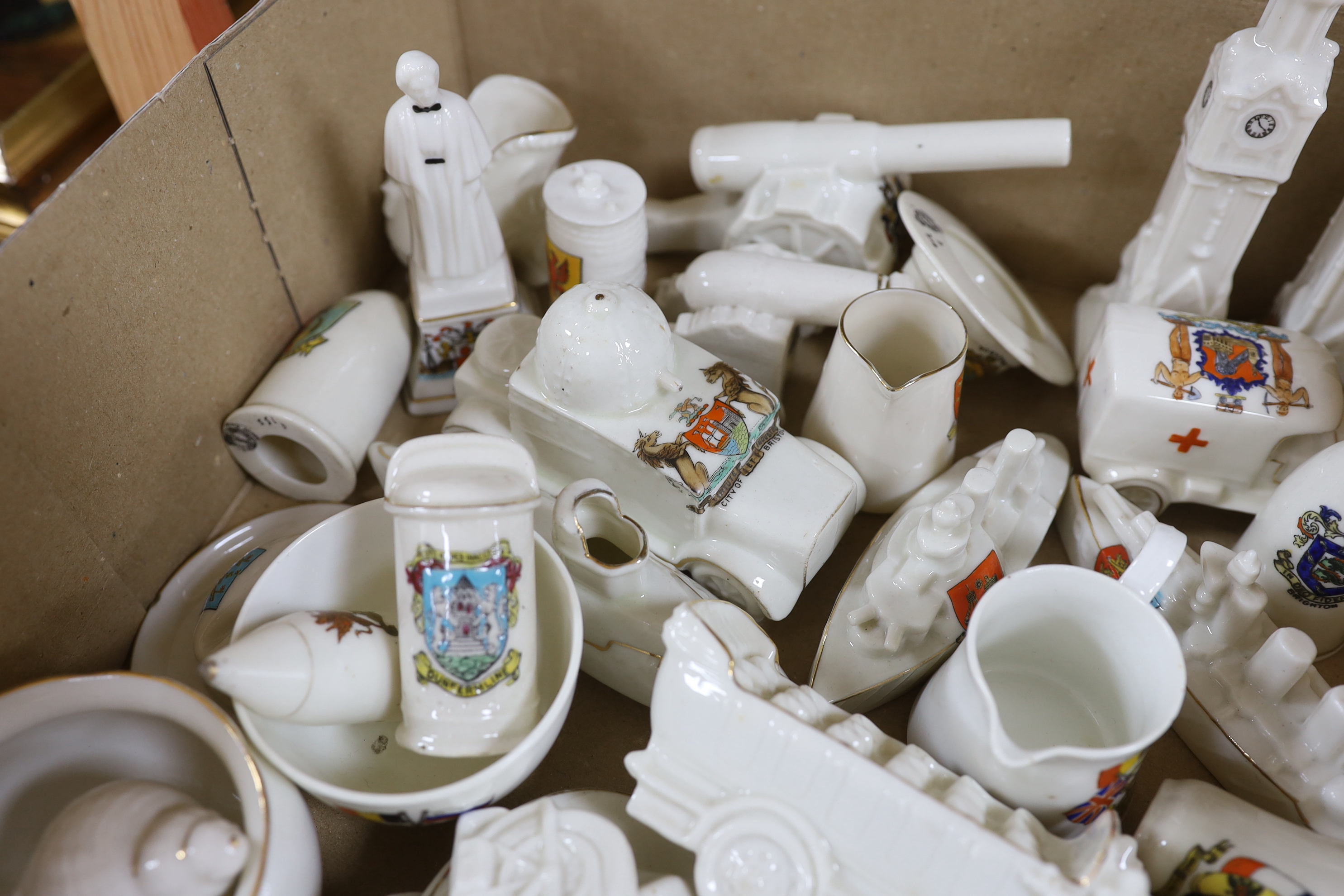 A collection of heraldic miniature crested china including W H Goss and Swan, the largest each 16.5cm high